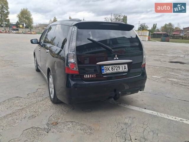 Міцубісі Грандіс 2006 у Первомайськ на Automoto.ua Чорний Міцубісі Грандіс, об'ємом двигуна 2.38 л та пробігом 220 тис. км за 6700 $, фото 9 на Automoto.ua