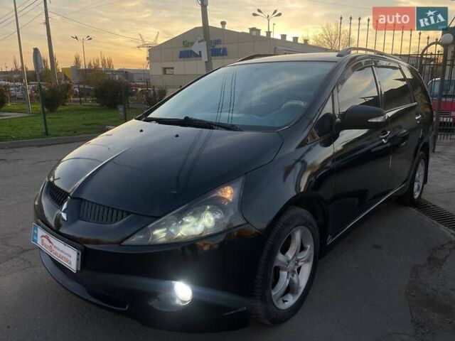 Черный Мицубиси Грандис, объемом двигателя 2.38 л и пробегом 197 тыс. км за 5299 $, фото 2 на Automoto.ua