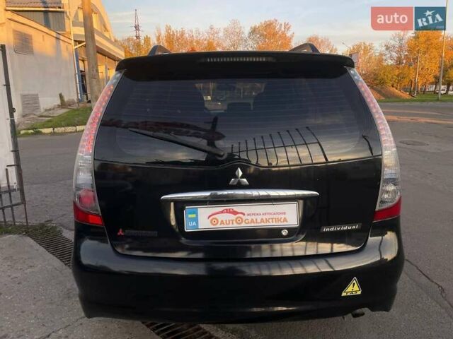 Черный Мицубиси Грандис, объемом двигателя 2.38 л и пробегом 197 тыс. км за 5299 $, фото 4 на Automoto.ua