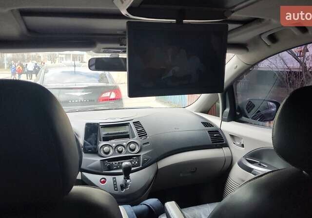 Чорний Міцубісі Грандіс, об'ємом двигуна 2.4 л та пробігом 261 тис. км за 6900 $, фото 22 на Automoto.ua