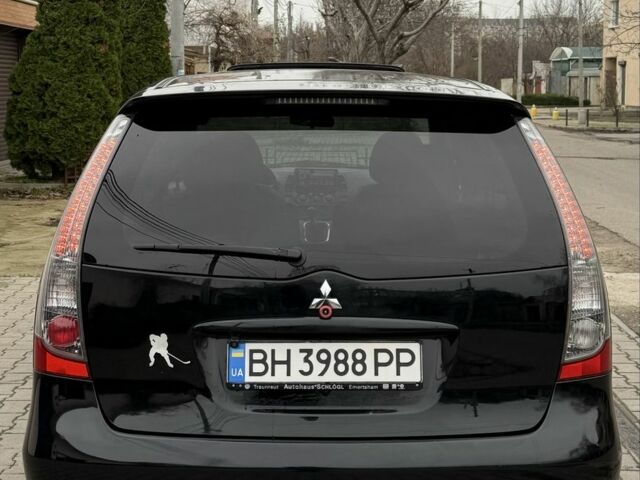 Черный Мицубиси Грандис, объемом двигателя 2 л и пробегом 222 тыс. км за 7150 $, фото 6 на Automoto.ua