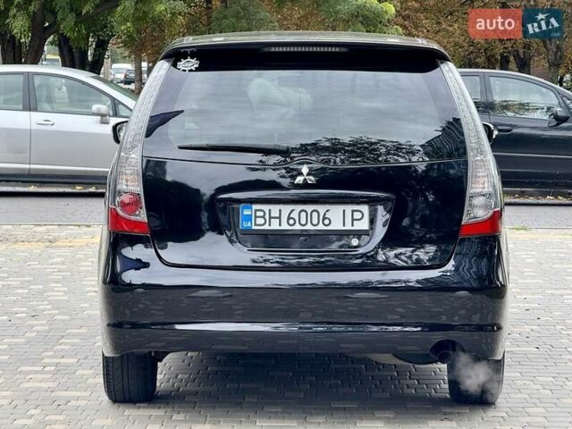Черный Мицубиси Грандис, объемом двигателя 2.4 л и пробегом 323 тыс. км за 5999 $, фото 10 на Automoto.ua