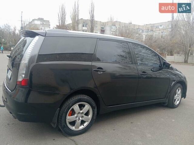 Черный Мицубиси Грандис, объемом двигателя 2.38 л и пробегом 272 тыс. км за 7000 $, фото 6 на Automoto.ua