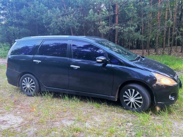 Черный Мицубиси Грандис, объемом двигателя 2.4 л и пробегом 209 тыс. км за 5500 $, фото 2 на Automoto.ua