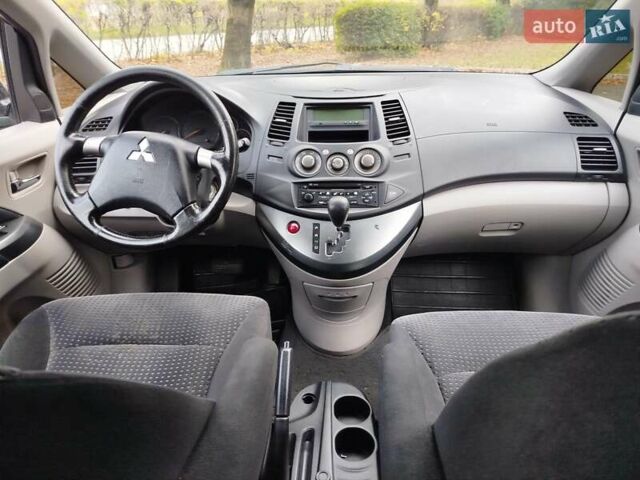 Черный Мицубиси Грандис, объемом двигателя 2.38 л и пробегом 215 тыс. км за 5900 $, фото 24 на Automoto.ua