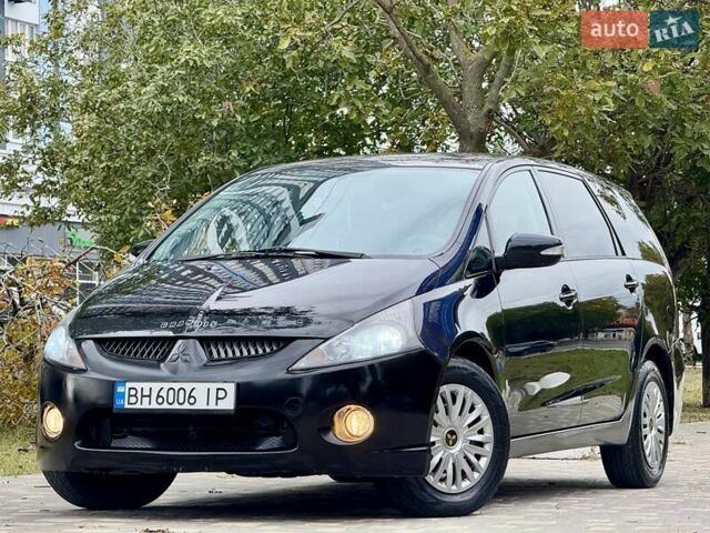 Черный Мицубиси Грандис, объемом двигателя 2.4 л и пробегом 323 тыс. км за 5999 $, фото 16 на Automoto.ua