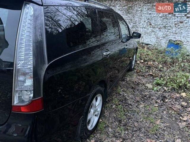 Чорний Міцубісі Грандіс, об'ємом двигуна 2.4 л та пробігом 270 тис. км за 3950 $, фото 3 на Automoto.ua