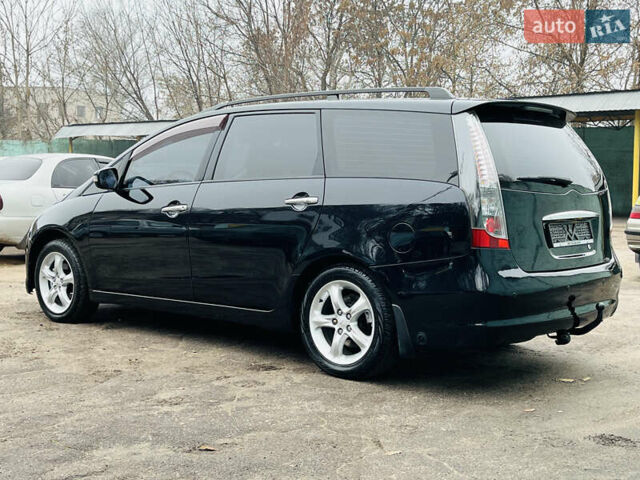 Черный Мицубиси Грандис, объемом двигателя 2.4 л и пробегом 188 тыс. км за 6800 $, фото 5 на Automoto.ua