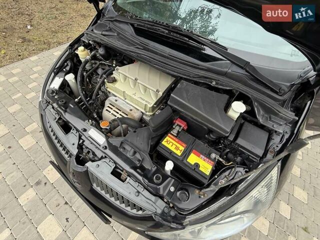 Черный Мицубиси Грандис, объемом двигателя 2.4 л и пробегом 323 тыс. км за 5999 $, фото 73 на Automoto.ua