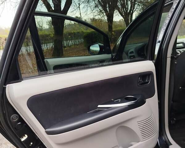 Черный Мицубиси Грандис, объемом двигателя 2.38 л и пробегом 215 тыс. км за 5900 $, фото 23 на Automoto.ua