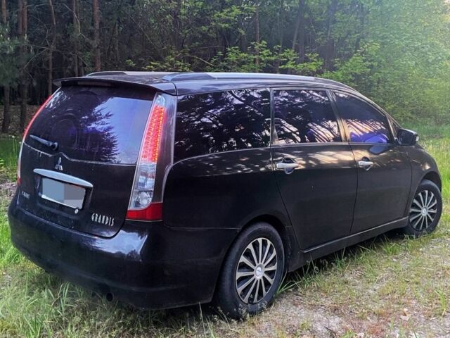 Черный Мицубиси Грандис, объемом двигателя 2.4 л и пробегом 209 тыс. км за 5500 $, фото 5 на Automoto.ua