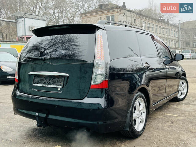 Черный Мицубиси Грандис, объемом двигателя 2.4 л и пробегом 188 тыс. км за 6800 $, фото 13 на Automoto.ua