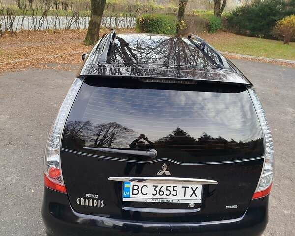 Черный Мицубиси Грандис, объемом двигателя 2.38 л и пробегом 215 тыс. км за 5900 $, фото 5 на Automoto.ua