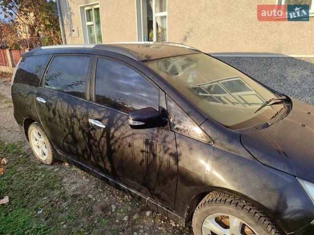 Черный Мицубиси Грандис, объемом двигателя 2.4 л и пробегом 130 тыс. км за 7200 $, фото 15 на Automoto.ua