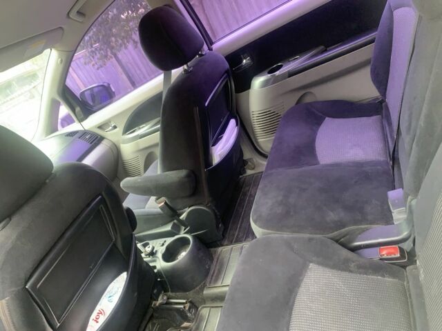 Черный Мицубиси Грандис, объемом двигателя 2.4 л и пробегом 209 тыс. км за 5500 $, фото 8 на Automoto.ua