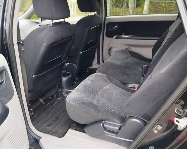 Черный Мицубиси Грандис, объемом двигателя 2.38 л и пробегом 215 тыс. км за 5900 $, фото 22 на Automoto.ua