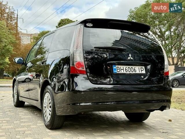 Черный Мицубиси Грандис, объемом двигателя 2.4 л и пробегом 323 тыс. км за 5999 $, фото 6 на Automoto.ua