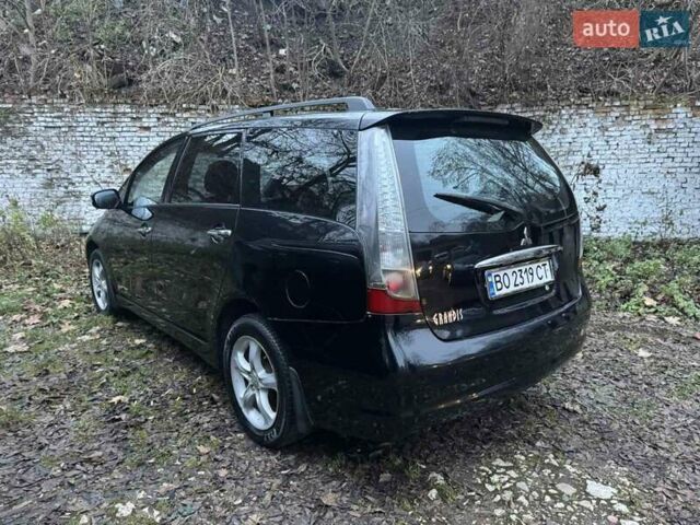 Чорний Міцубісі Грандіс, об'ємом двигуна 2.4 л та пробігом 270 тис. км за 3950 $, фото 9 на Automoto.ua