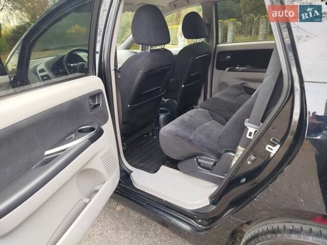 Черный Мицубиси Грандис, объемом двигателя 2.38 л и пробегом 215 тыс. км за 5900 $, фото 12 на Automoto.ua