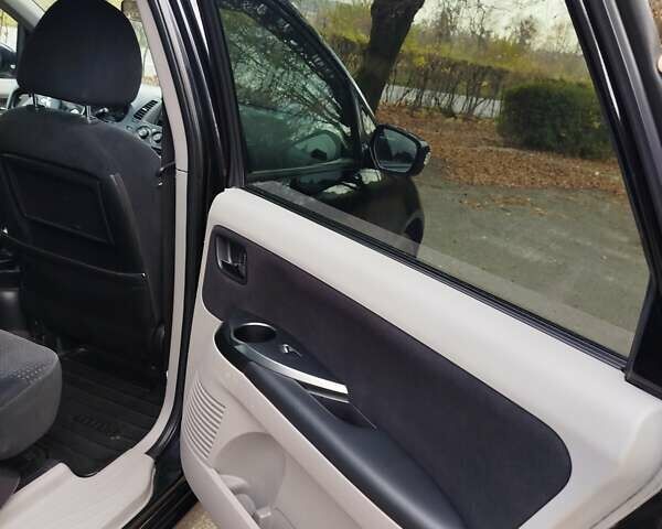 Черный Мицубиси Грандис, объемом двигателя 2.38 л и пробегом 215 тыс. км за 5900 $, фото 18 на Automoto.ua