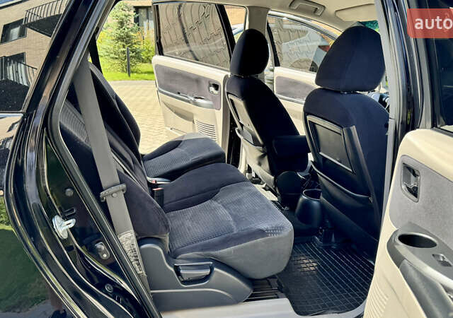 Черный Мицубиси Грандис, объемом двигателя 2.4 л и пробегом 121 тыс. км за 6450 $, фото 69 на Automoto.ua