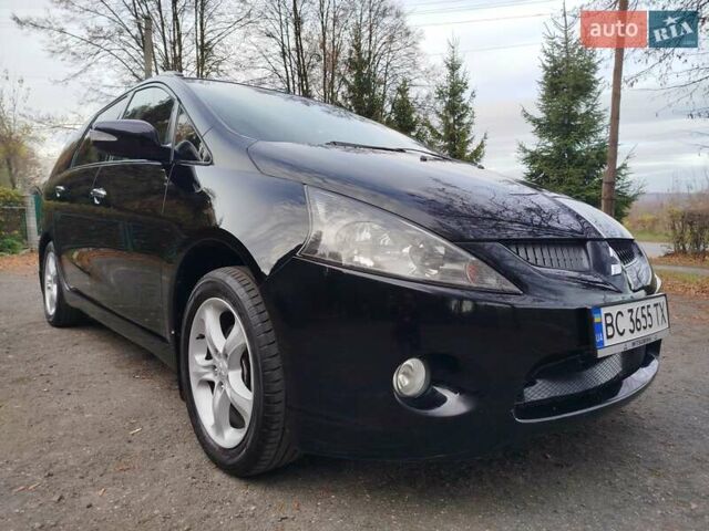 Черный Мицубиси Грандис, объемом двигателя 2.38 л и пробегом 215 тыс. км за 5900 $, фото 8 на Automoto.ua