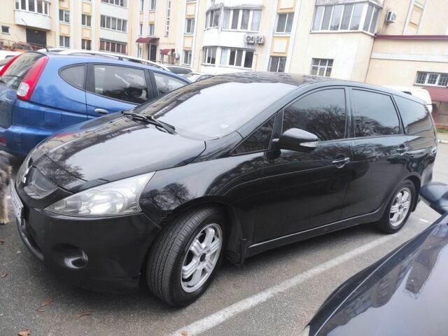 Черный Мицубиси Грандис, объемом двигателя 2.4 л и пробегом 320 тыс. км за 5700 $, фото 2 на Automoto.ua