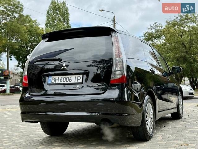 Черный Мицубиси Грандис, объемом двигателя 2.4 л и пробегом 323 тыс. км за 5999 $, фото 5 на Automoto.ua