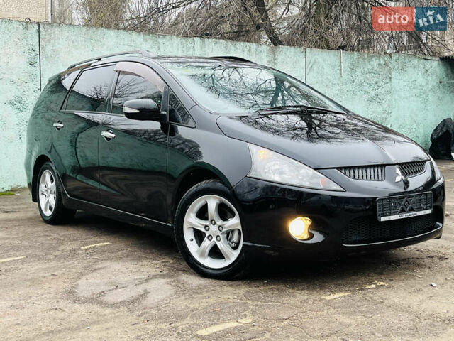 Черный Мицубиси Грандис, объемом двигателя 2.4 л и пробегом 188 тыс. км за 6800 $, фото 17 на Automoto.ua