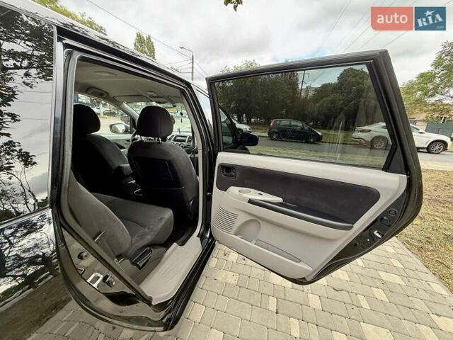 Черный Мицубиси Грандис, объемом двигателя 2.4 л и пробегом 323 тыс. км за 5999 $, фото 60 на Automoto.ua