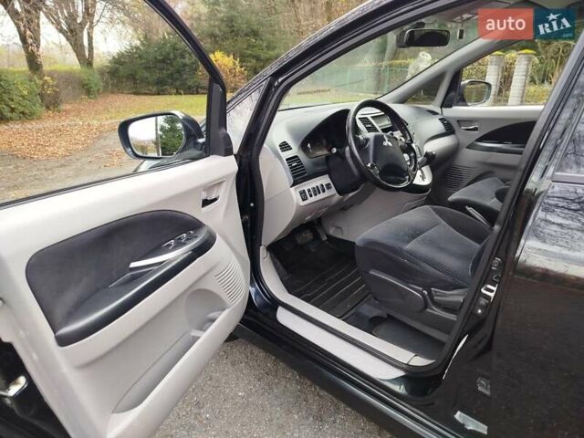 Черный Мицубиси Грандис, объемом двигателя 2.38 л и пробегом 215 тыс. км за 5900 $, фото 11 на Automoto.ua