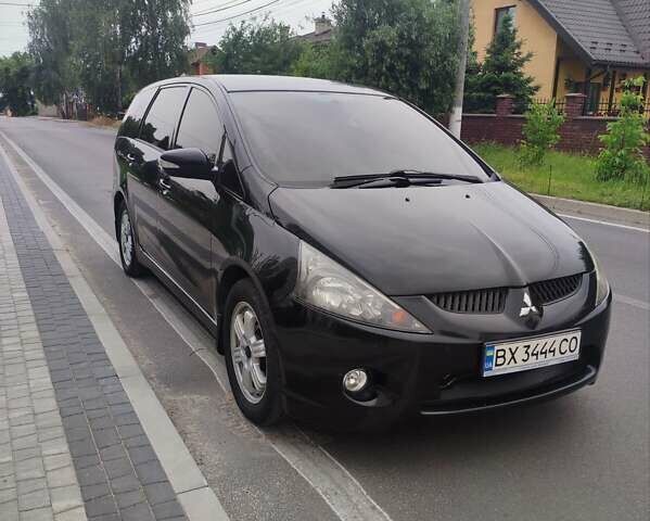 Черный Мицубиси Грандис, объемом двигателя 2.4 л и пробегом 315 тыс. км за 5800 $, фото 1 на Automoto.ua
