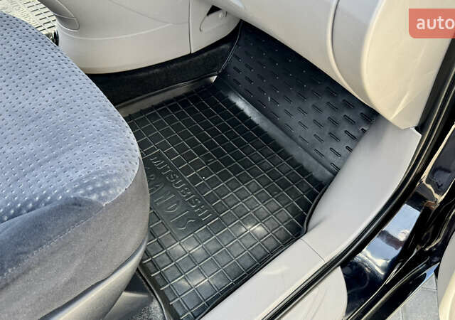 Черный Мицубиси Грандис, объемом двигателя 2.4 л и пробегом 121 тыс. км за 6450 $, фото 63 на Automoto.ua