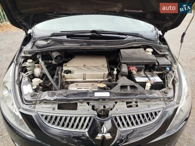 Черный Мицубиси Грандис, объемом двигателя 2.38 л и пробегом 215 тыс. км за 5900 $, фото 25 на Automoto.ua