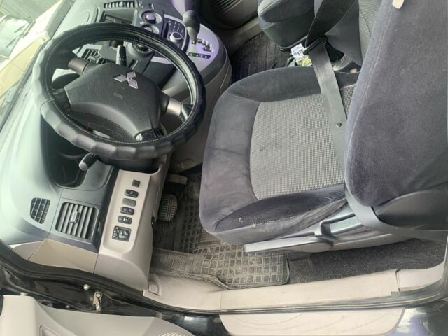 Черный Мицубиси Грандис, объемом двигателя 2.4 л и пробегом 209 тыс. км за 5500 $, фото 10 на Automoto.ua