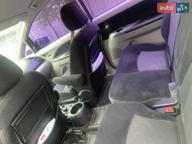 Черный Мицубиси Грандис, объемом двигателя 2.4 л и пробегом 209 тыс. км за 5500 $, фото 2 на Automoto.ua