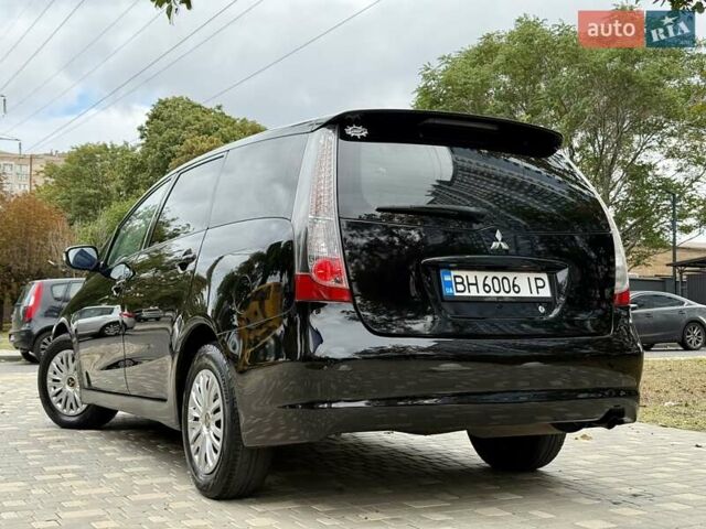 Черный Мицубиси Грандис, объемом двигателя 2.4 л и пробегом 323 тыс. км за 5999 $, фото 30 на Automoto.ua