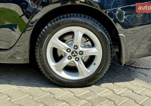 Черный Мицубиси Грандис, объемом двигателя 2.4 л и пробегом 121 тыс. км за 6450 $, фото 36 на Automoto.ua