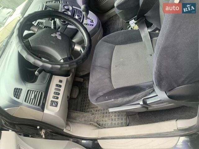 Черный Мицубиси Грандис, объемом двигателя 2.4 л и пробегом 209 тыс. км за 5500 $, фото 6 на Automoto.ua