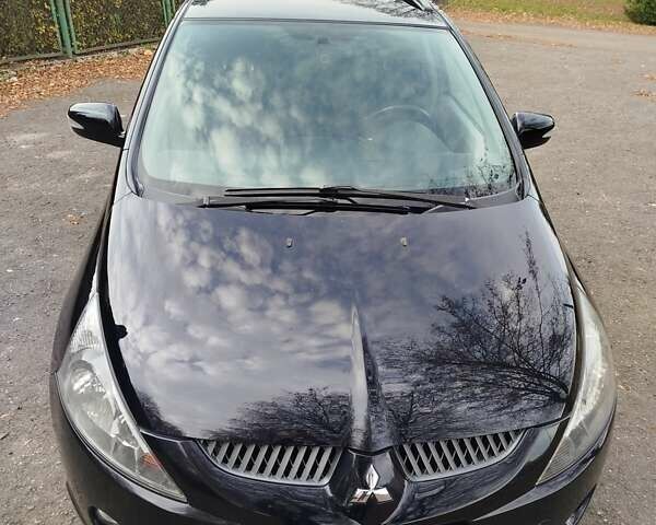 Черный Мицубиси Грандис, объемом двигателя 2.38 л и пробегом 215 тыс. км за 5900 $, фото 9 на Automoto.ua