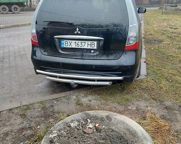 Черный Мицубиси Грандис, объемом двигателя 2.4 л и пробегом 260 тыс. км за 5990 $, фото 2 на Automoto.ua