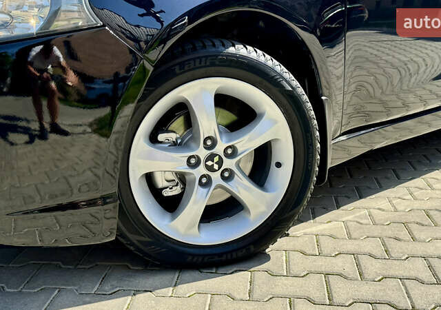 Черный Мицубиси Грандис, объемом двигателя 2.4 л и пробегом 121 тыс. км за 6450 $, фото 32 на Automoto.ua