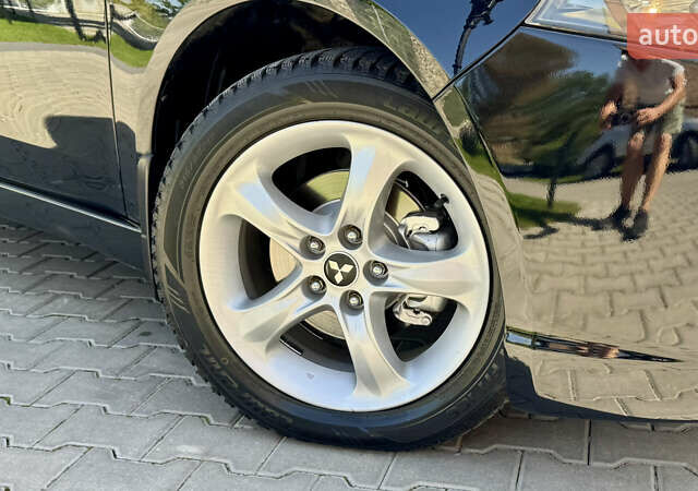 Черный Мицубиси Грандис, объемом двигателя 2.4 л и пробегом 121 тыс. км за 6450 $, фото 10 на Automoto.ua