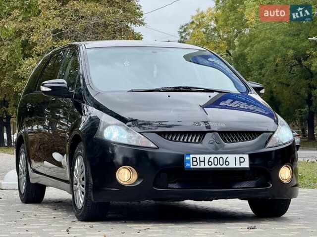 Черный Мицубиси Грандис, объемом двигателя 2.4 л и пробегом 323 тыс. км за 5999 $, фото 4 на Automoto.ua