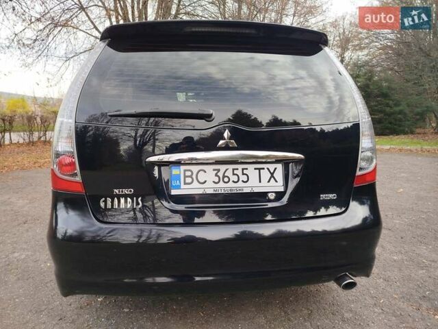 Черный Мицубиси Грандис, объемом двигателя 2.38 л и пробегом 215 тыс. км за 5900 $, фото 4 на Automoto.ua