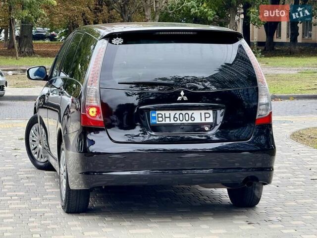 Черный Мицубиси Грандис, объемом двигателя 2.4 л и пробегом 323 тыс. км за 5999 $, фото 29 на Automoto.ua