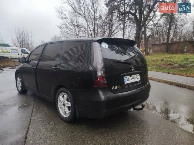 Черный Мицубиси Грандис, объемом двигателя 2.4 л и пробегом 315 тыс. км за 5800 $, фото 13 на Automoto.ua