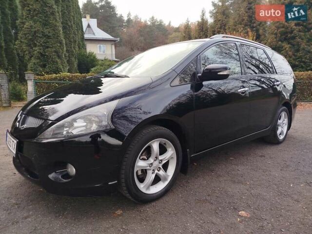 Черный Мицубиси Грандис, объемом двигателя 2.38 л и пробегом 215 тыс. км за 5900 $, фото 1 на Automoto.ua