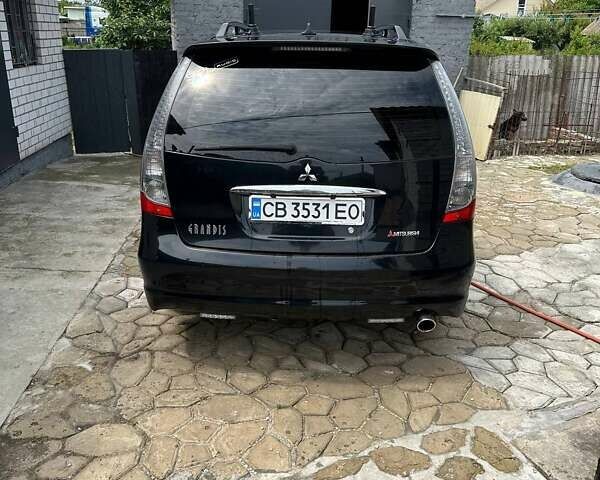 Черный Мицубиси Грандис, объемом двигателя 2.4 л и пробегом 335 тыс. км за 5700 $, фото 5 на Automoto.ua