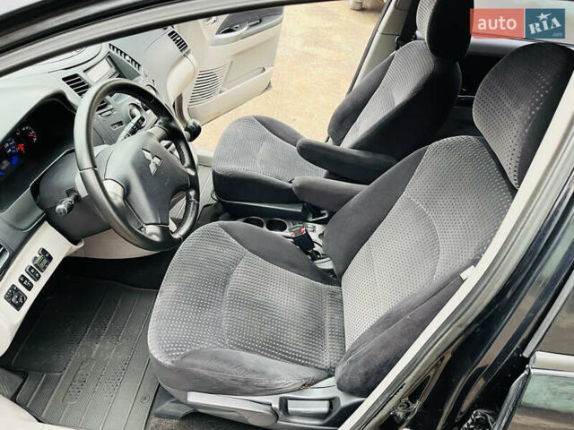 Черный Мицубиси Грандис, объемом двигателя 2.4 л и пробегом 188 тыс. км за 6800 $, фото 25 на Automoto.ua